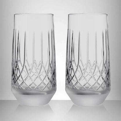 Two clear cut-crystal highball glasses with vertical and diamond-patterned engravings, shown side-by-side on a reflective light gray surface against a neutral gray background from our Waterford Crystal Australia – Outlet & Sale Collection